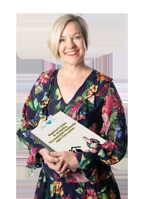 Susan LeRoux holding her book "Beginners Guide to Navigating The Australian Residential Aged Care System"
